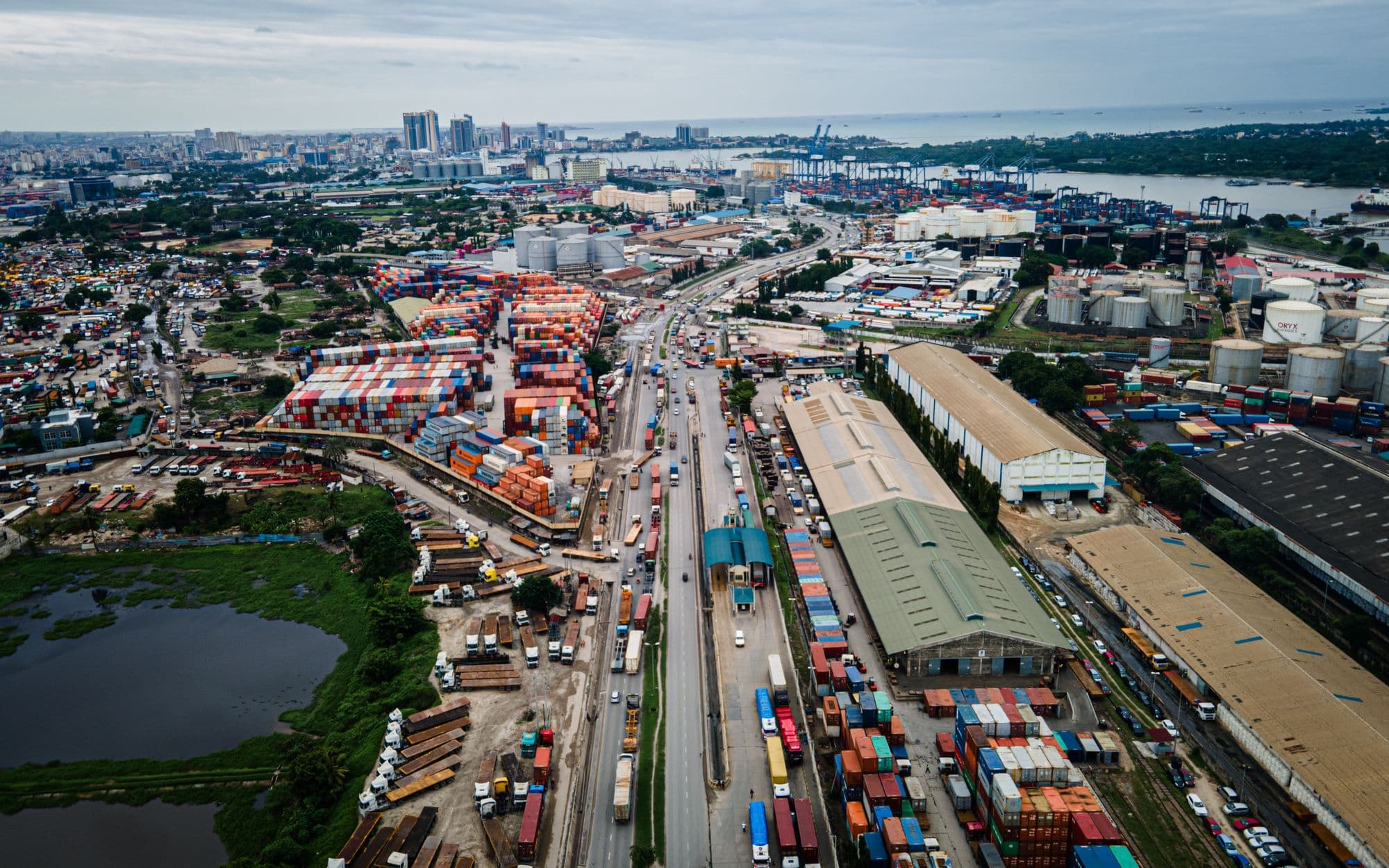 Aerial view of the Dar es Salaam port area with container yards beside the railway and city